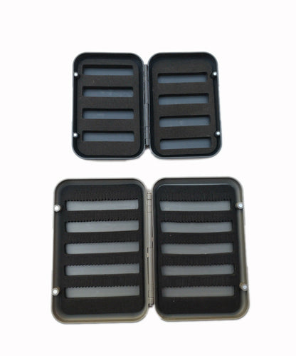 Small and large fly boxes open for a layout comparison