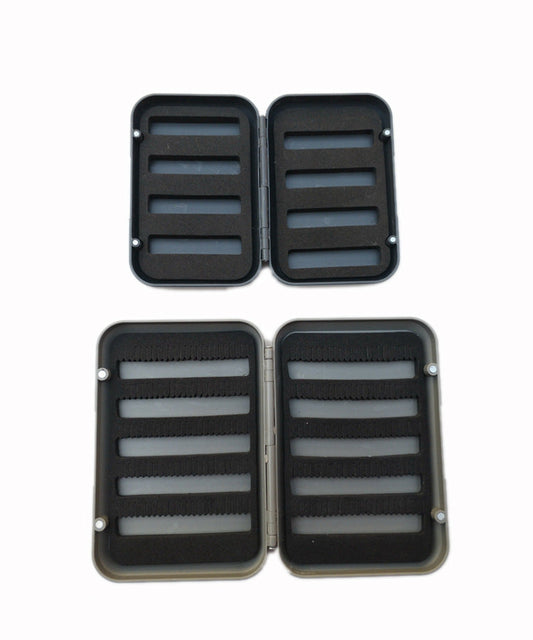 Small and large fly boxes open for a layout comparison