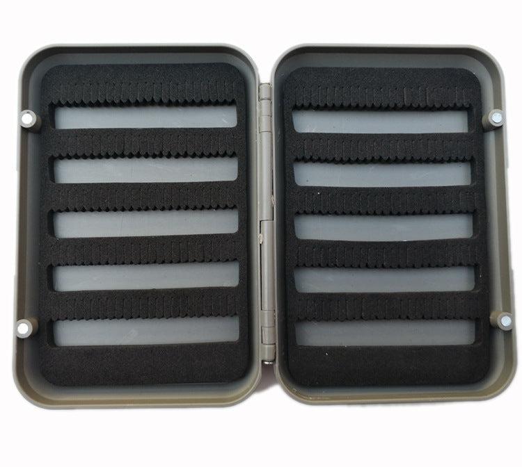 Large fly box open to show foam strips on both interior faces