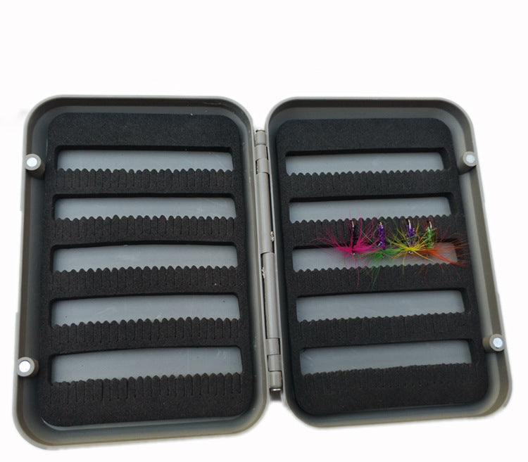 Open large fly box showing foam rows with flies as examples