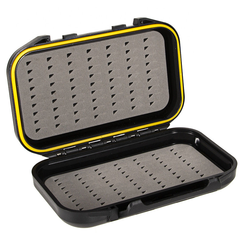 Open black fly box showing two slit-foam storage faces